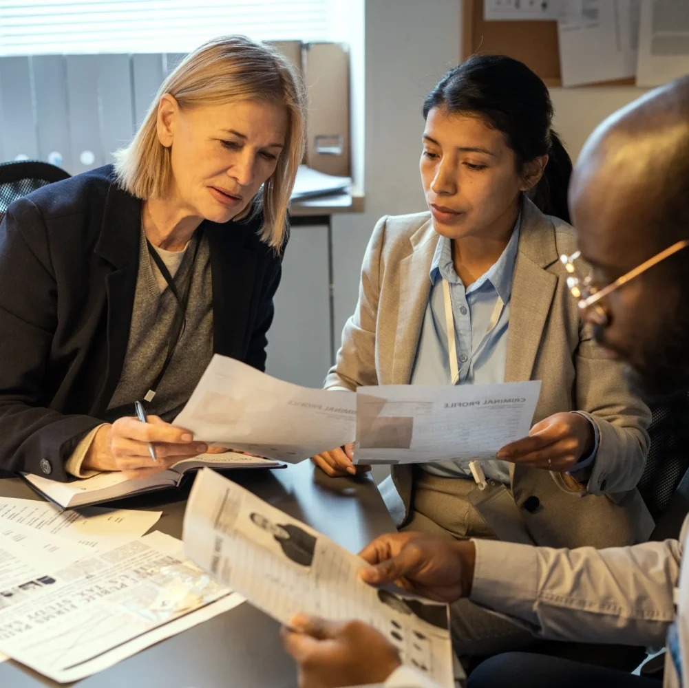 two-intercultural-female-agents-comparing-informat-2025-03-13-08-15-43-utc